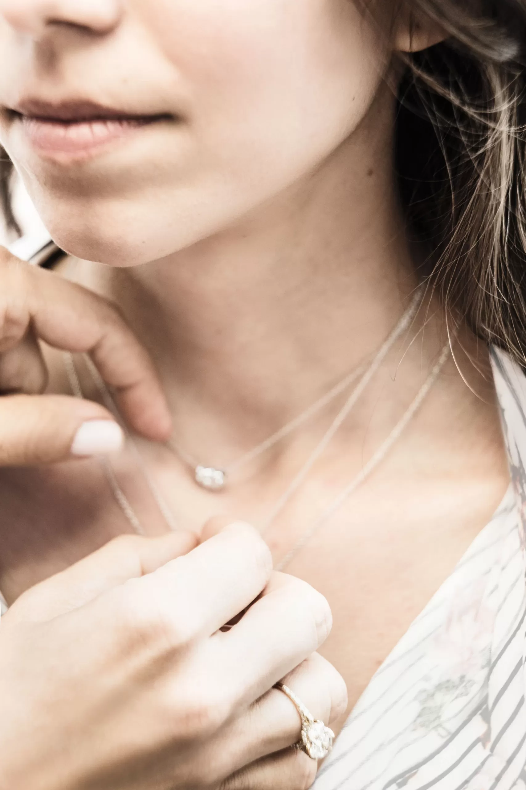 About House Of Brilliance Woman wearing handcrafted jewelry from a shop in Dallas, TX